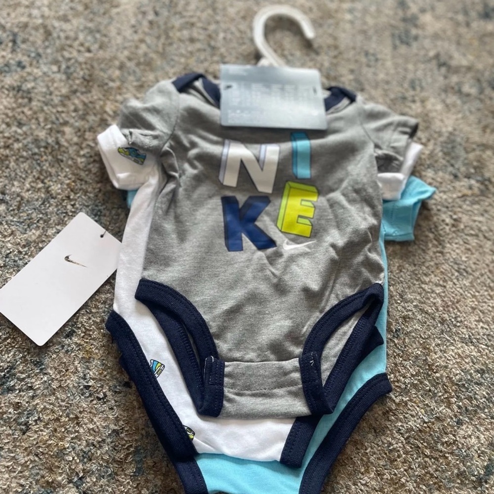 Nike Light Blue Baby One-Piece Bodysuit with Navy Trim - Picture 2 of 3
